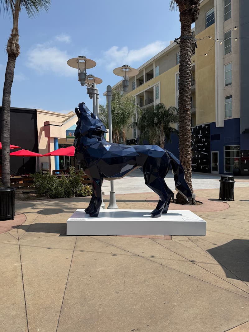 Richard Orlinski's navy howling wolf sculpture on display in Downtown Burbank